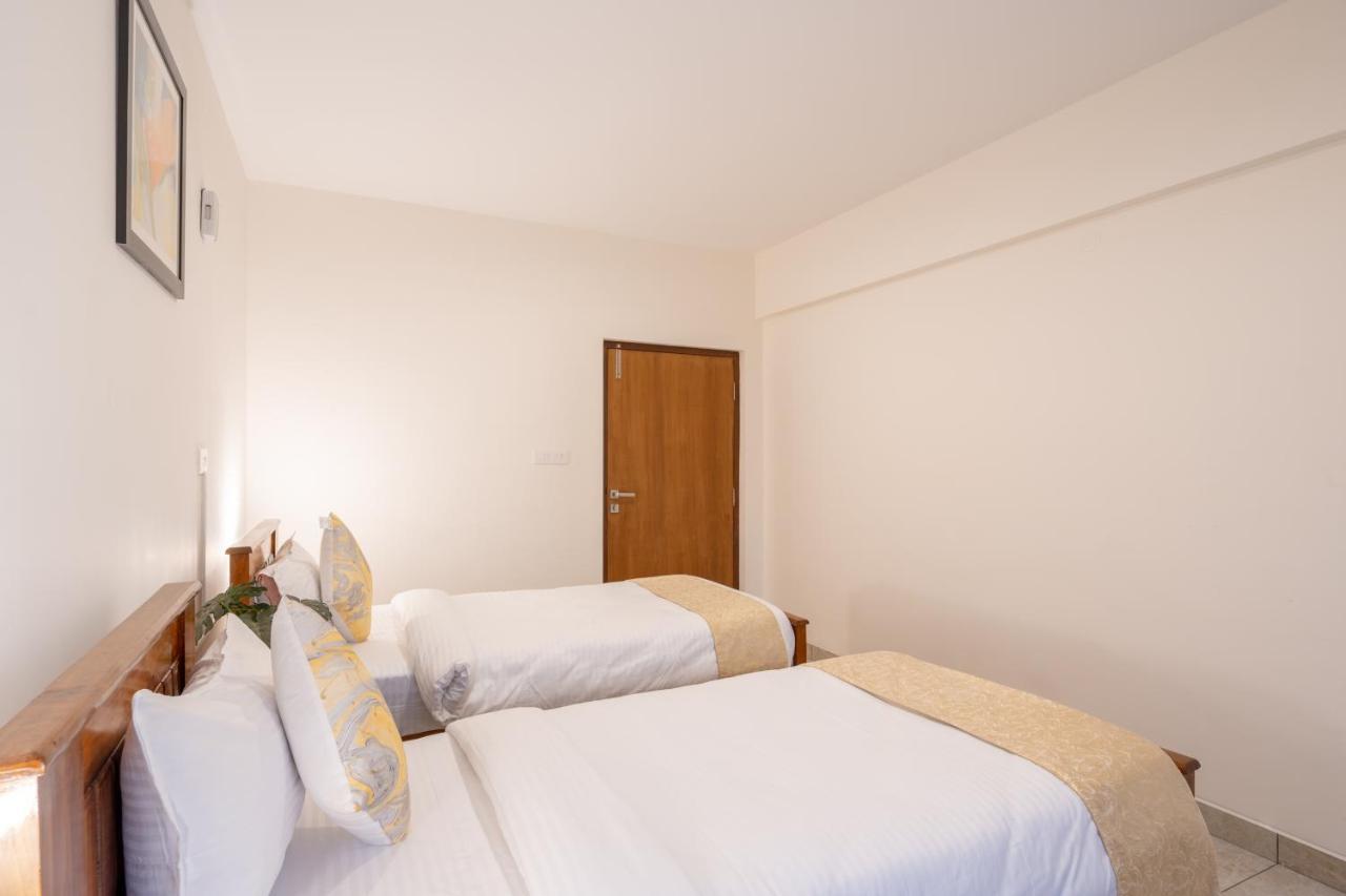 The Silver Chimes Suites Bangalore Buitenkant foto